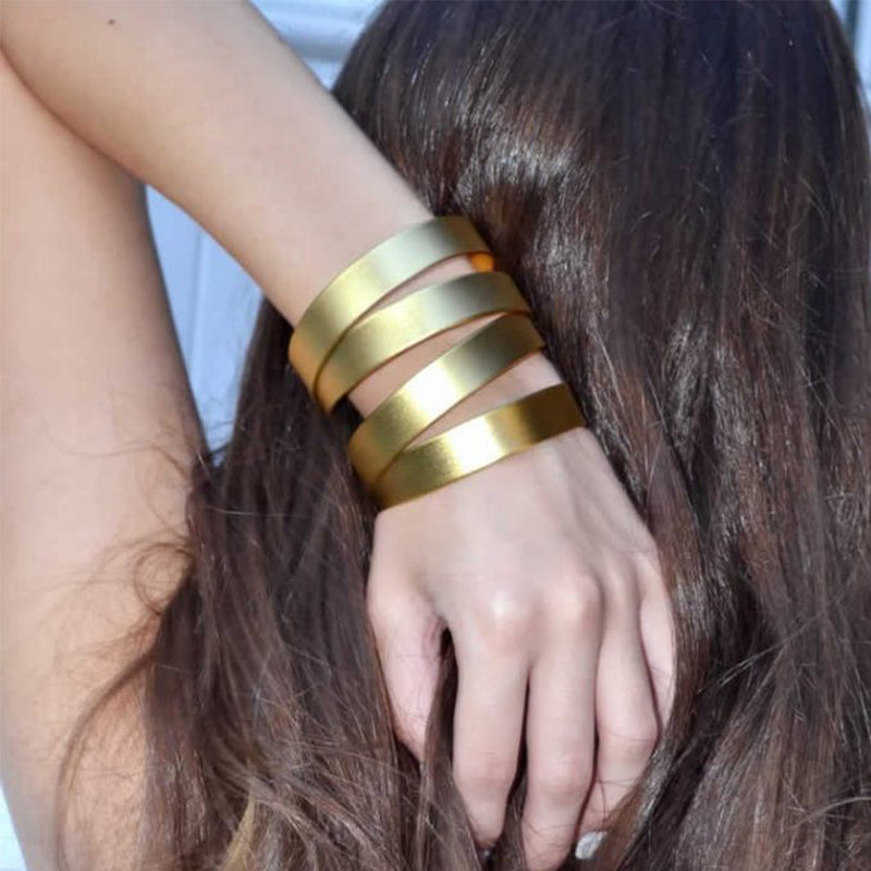Thick gold multi band cuff bracelet