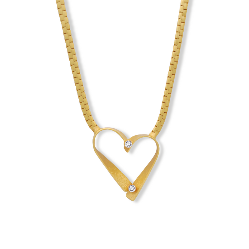 gold heart pendant necklace with white crystal