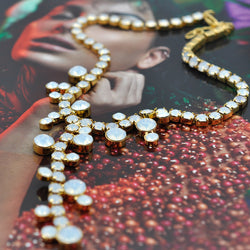 Gold Y shape costume necklace with white opal Swarovski crystals