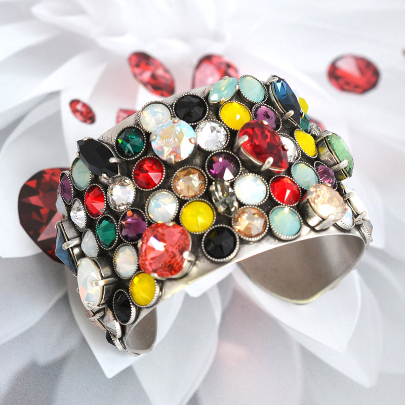 Silver cuff bracelet covered with multi color Swarovski crystal