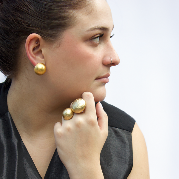 button gold earrings