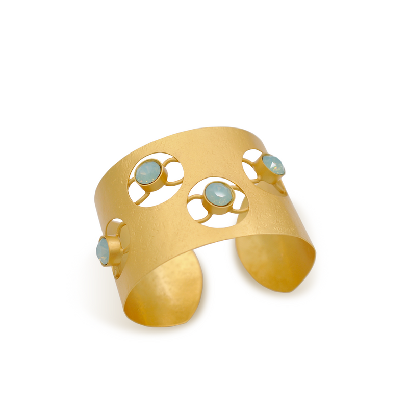 Gold wide cuff bracelet with pacific blue crystal