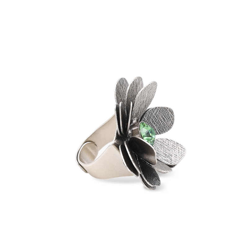 silver flower statement ring with green crystal