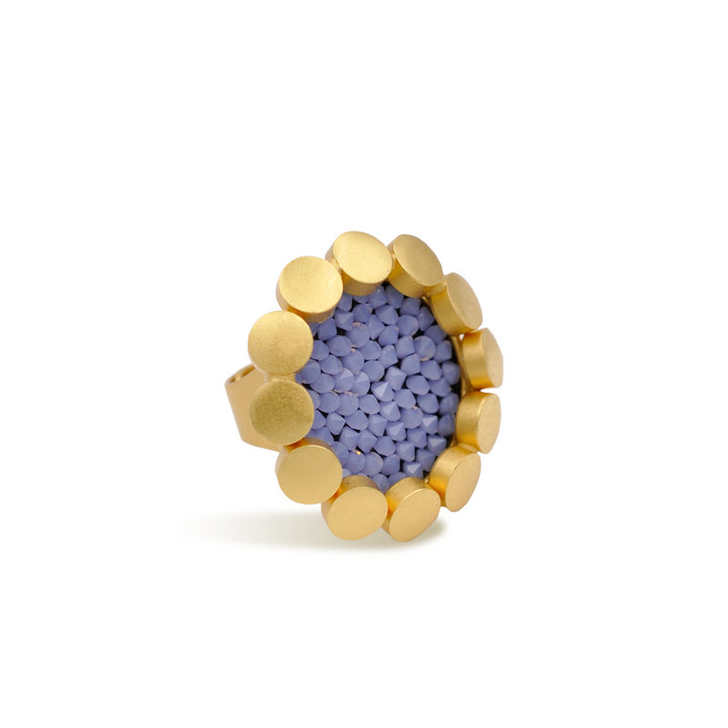 round gold statement ring with blue crystals