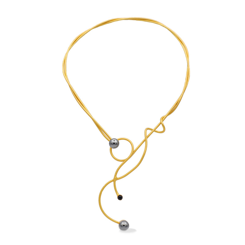 Gold sculptural necklace with black pearls