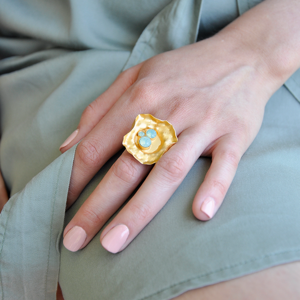 Gold floral statement ring with pacific blue crystals