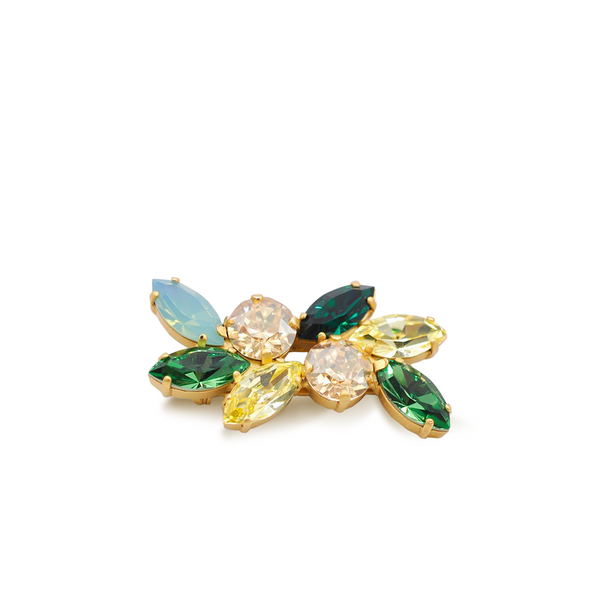 Crystal gold brooch with emerald