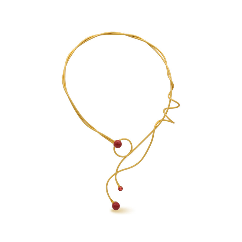 Gold sculptural necklace with coral beads