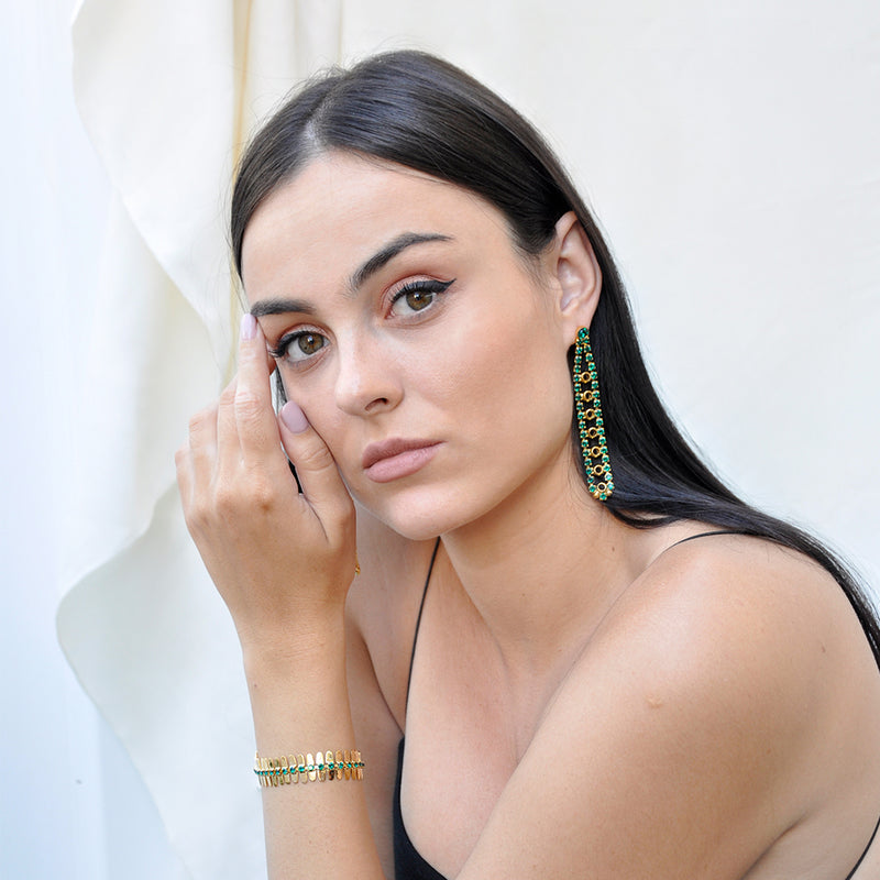 Gold chandelier earrings with Erinite green crystals