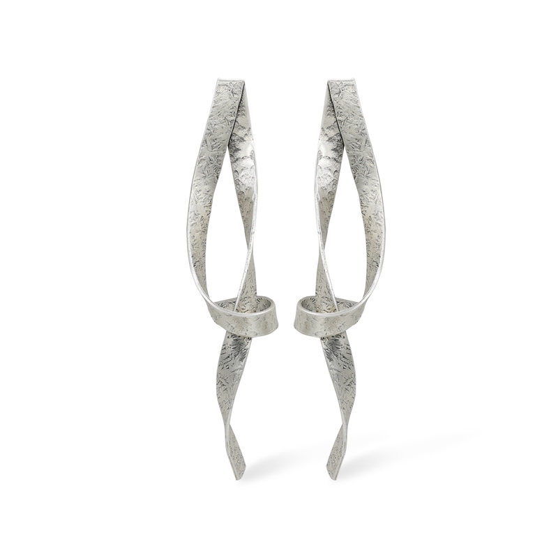 ribbon style silver statement earrings