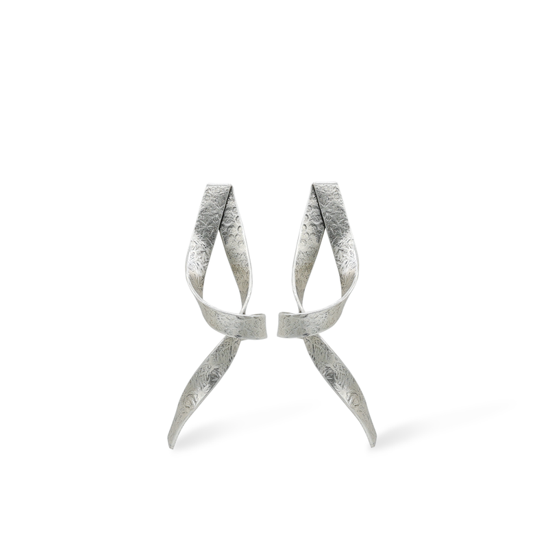 ribbon style silver statement earrings