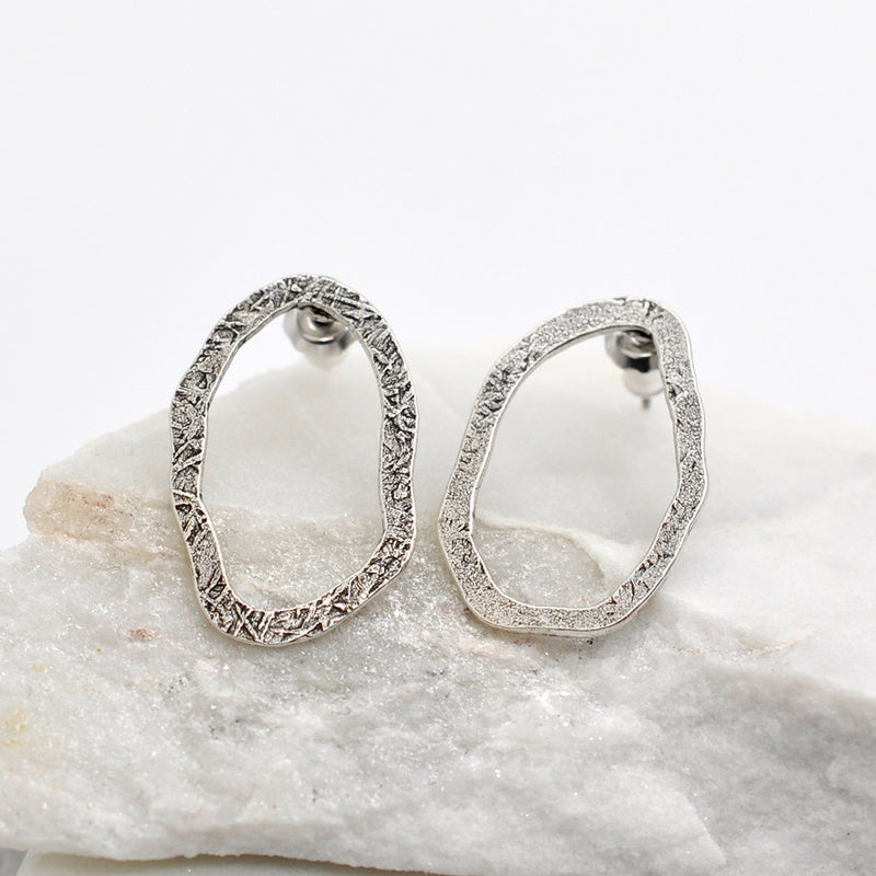 asymmetric silver stud earrings