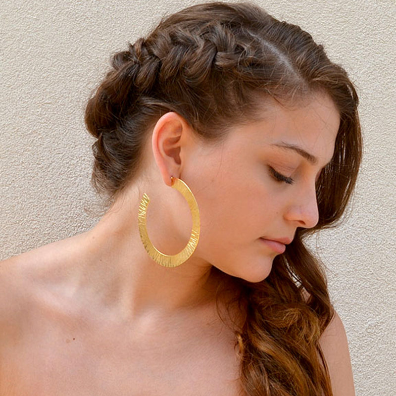 Hammered gold large hoop earrings